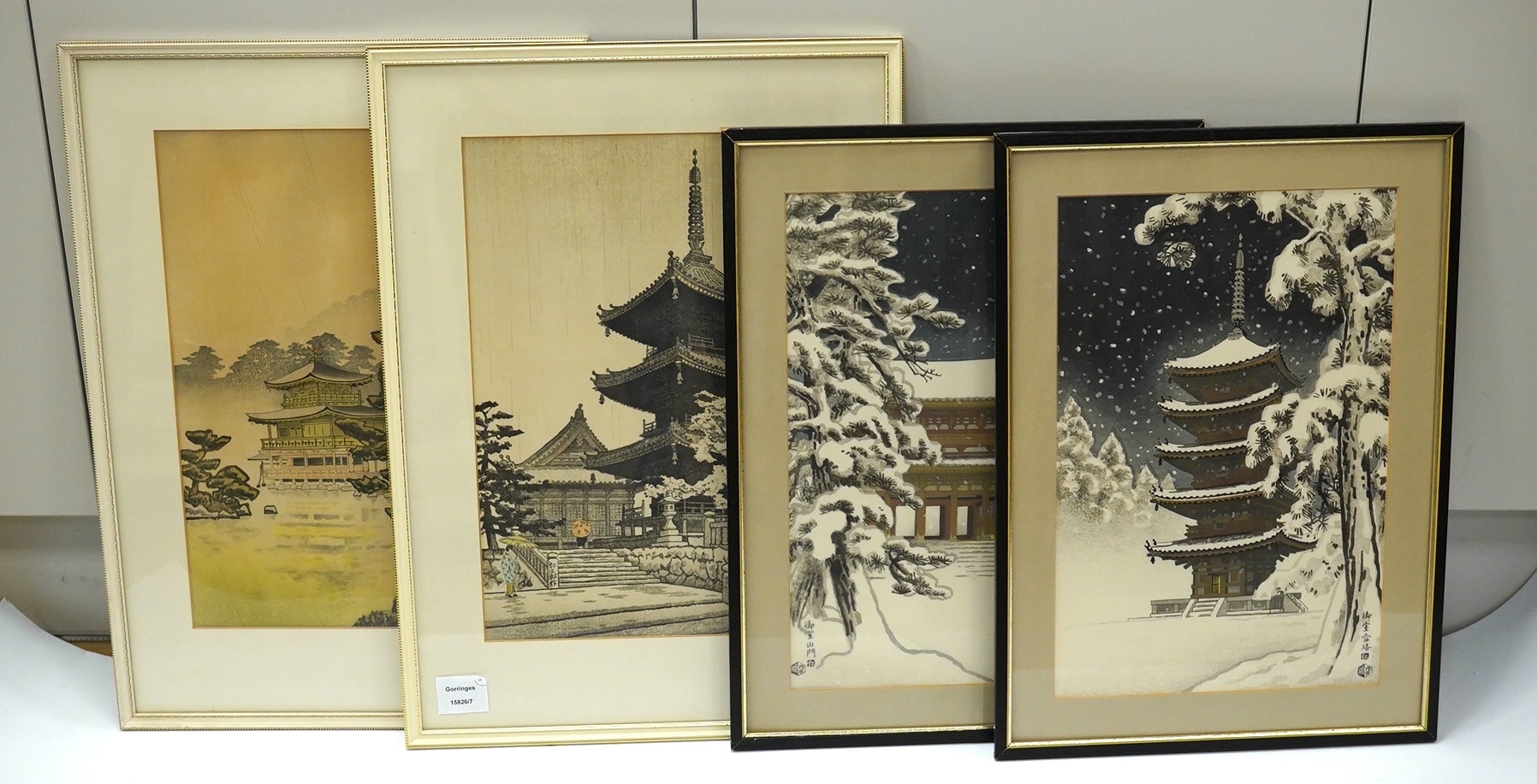 Nisaburo Ito (1905-2001), two pairs of Japanese woodblock prints, Pagodas, signed with character marks, largest each 39 x 26cm. Condition - fair to good, some minor discolouration